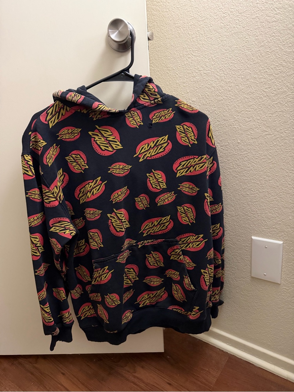 Santa Cruz Skateboards Black Hoodie with Red and Yellow Logo Print